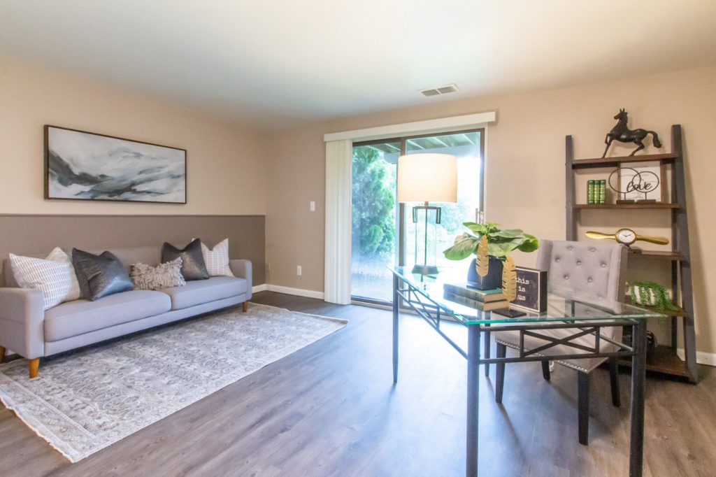 Townhomes and apartments in Clarkston, sunny interior living room 